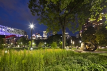 An intimately scaled space is carved within the Grove to feature Henry Moore's, "Large Two Forms"
