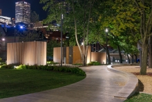 Three discrete sculptural washroom pavilions are positioned amongst the existing trees and create a focal point.