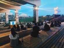 View of an intimate evening discussion at the Strachan Gate overlook.  Image Credit The Bentway Conservancy
