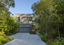 The design seeks to be bold and innovative, but also -as clusters of daisies graze the metal screens- delicate and playful.