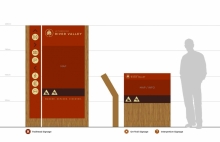 Finer scale design standards, parks signage branding, and interpretive feature standards are specified.