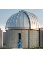 The Science Courtyard was designed to support the Starry Night events. Open areas and electrical outlets are located to allow amateur astronomers opportunities to set up their own telescopes for public use. A carefully located window always allows views into the Observatory and the telescope.
